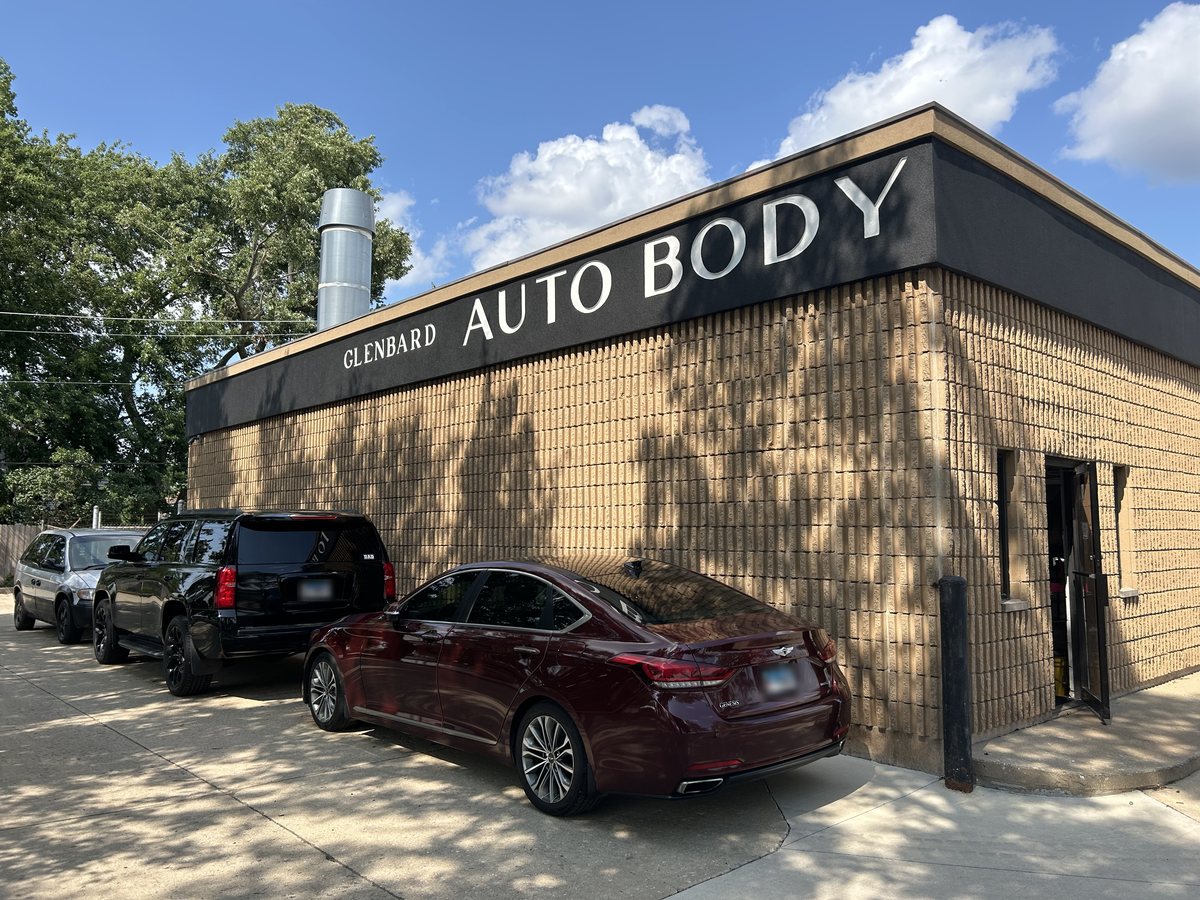 Customer vehicles outside the Glenbard Auto Body shop