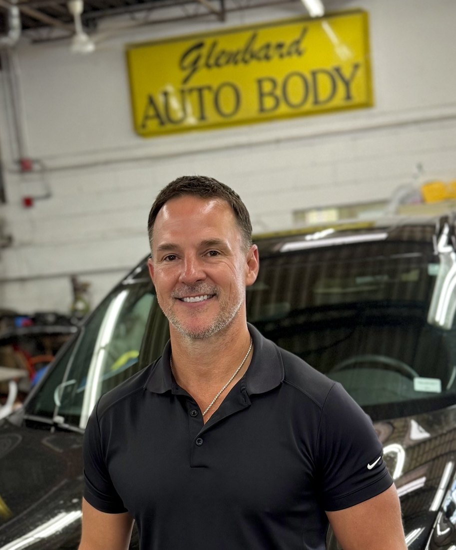 Jeff Wolak, owner of Glenbard Auto Body, in the shop in Lombard, Illinois